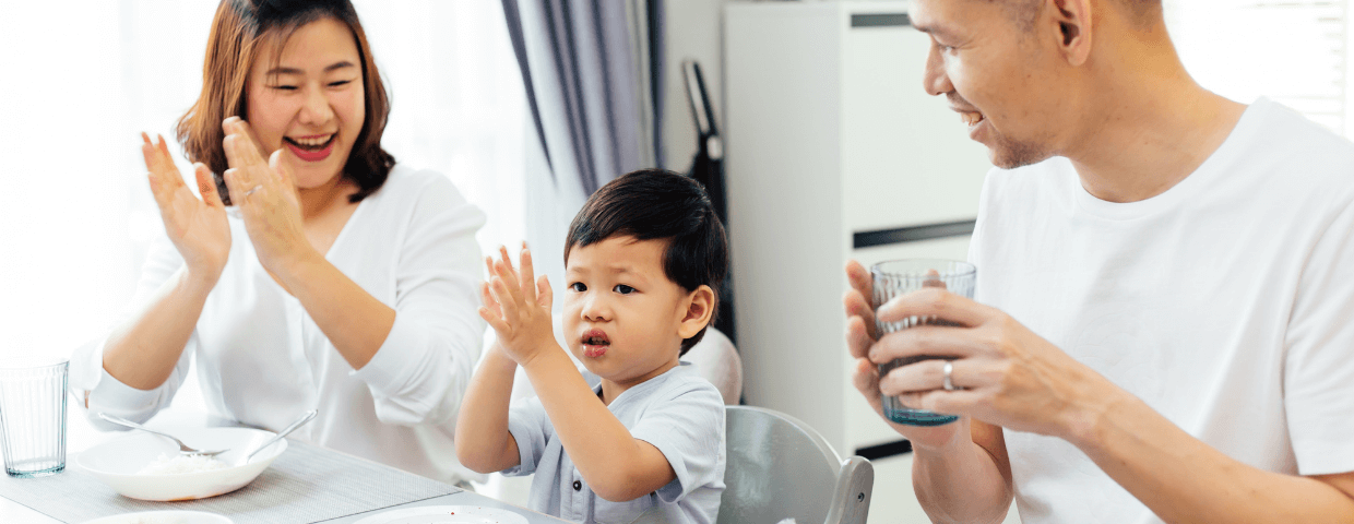 Family clapping together