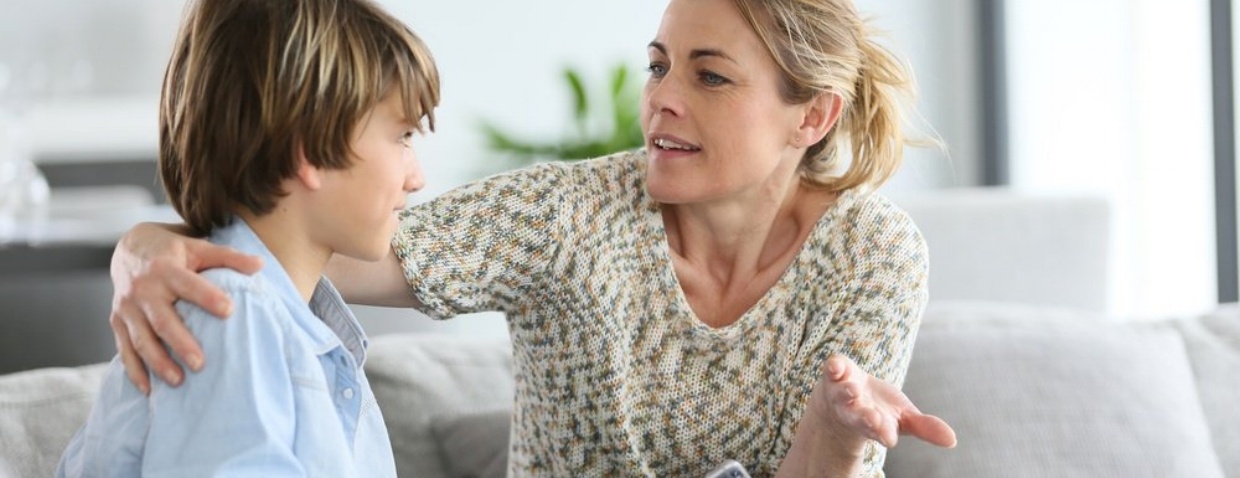 mother apologizing to young son