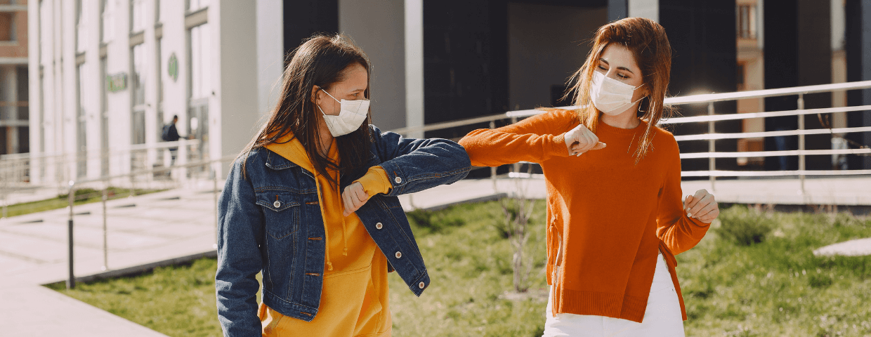 Teens using elbows to high-five