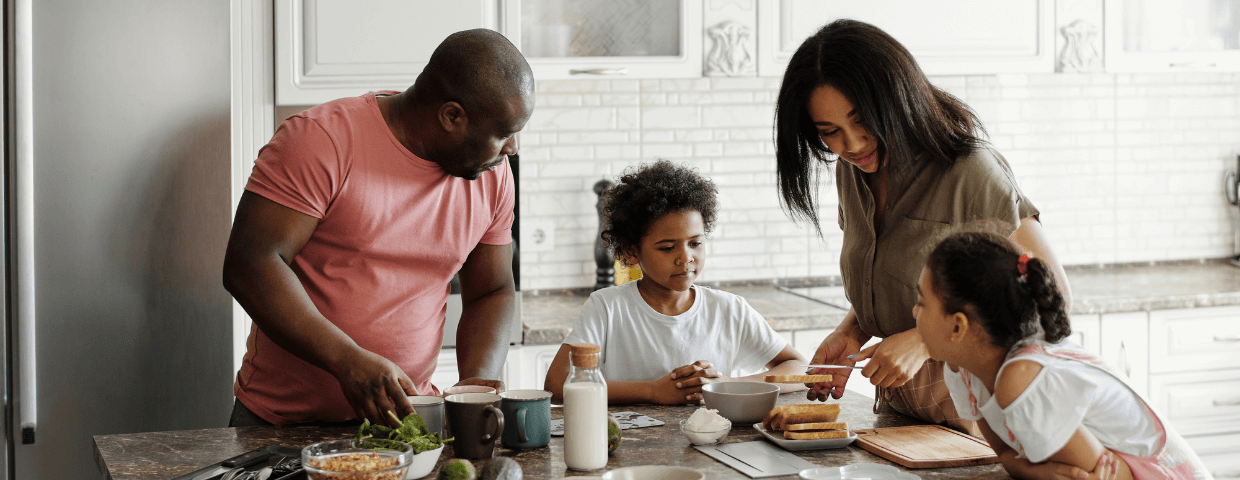 a young family gathered and talking