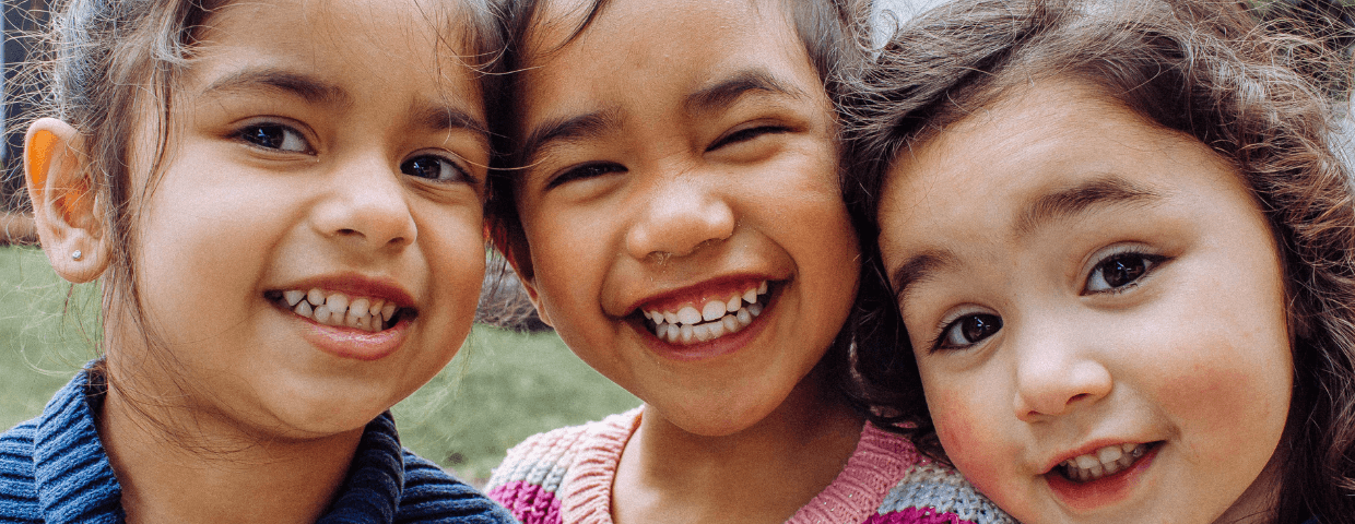 3 little girls on playground