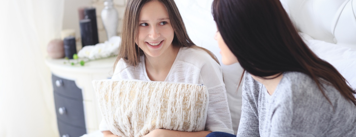 mother talking to daughter