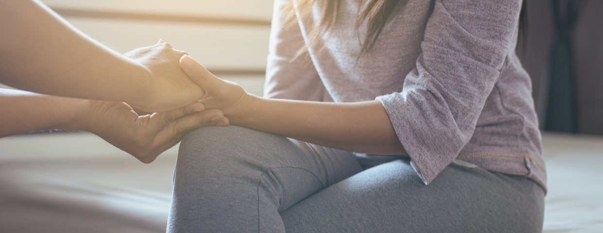 woman being comforted