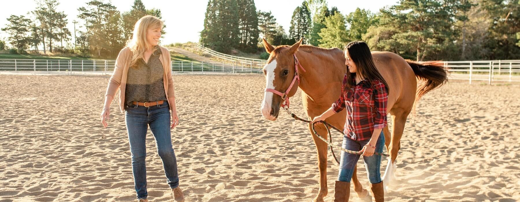 teen girl in equine therapy session